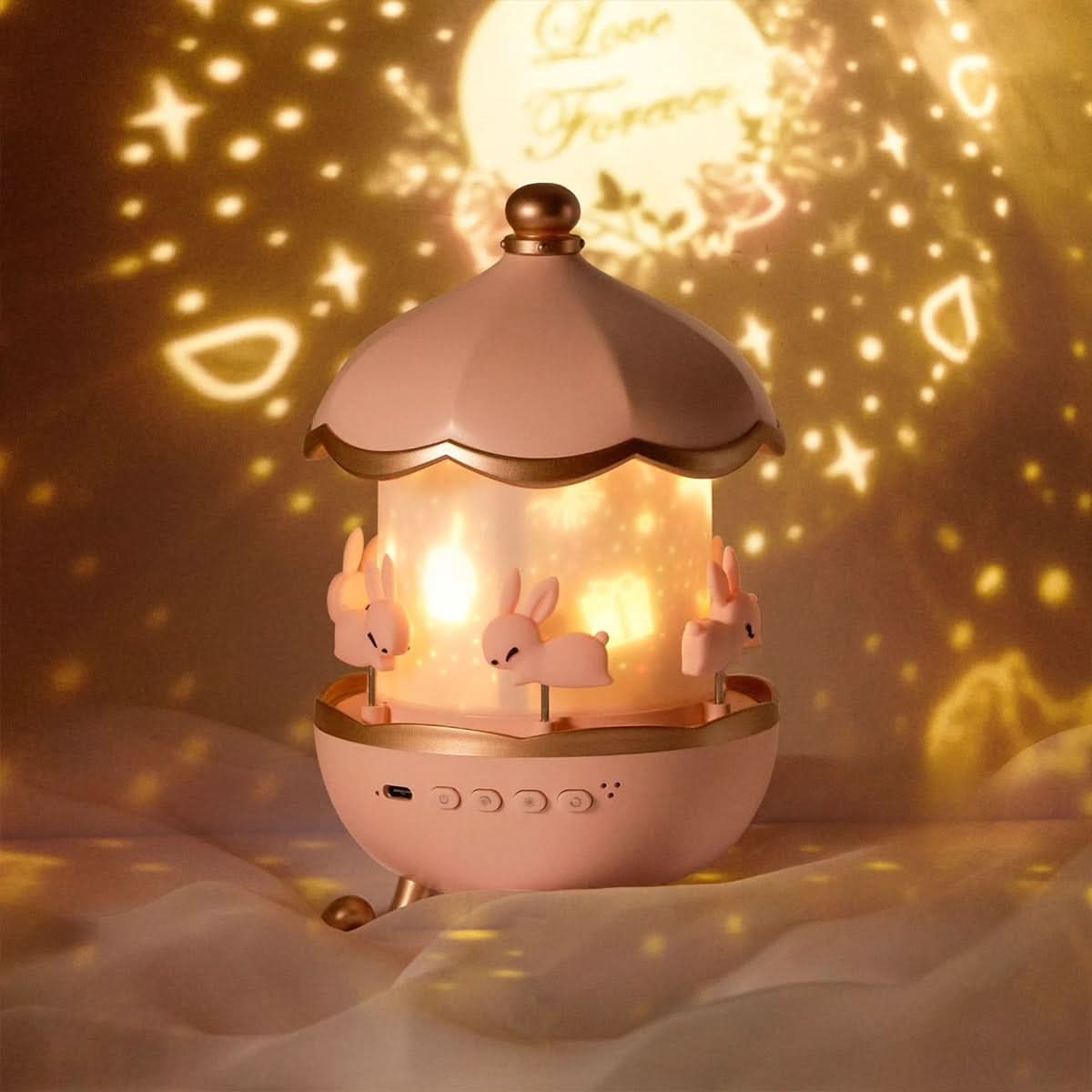 Roze Luminova sterrenprojector met konijnenfiguren en warme lichtprojectie