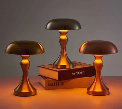 Verlichte Stella tafellampen met gebogen voet in goud, zilver en roségoud