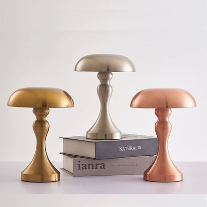 Stella tafellampen met gebogen voet in goud, zilver en roségoud